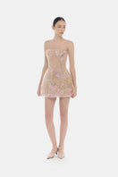 Montsand pastel mini dress with floral embellishments, featuring a fitted silhouette and delicate fabric for a feminine look.