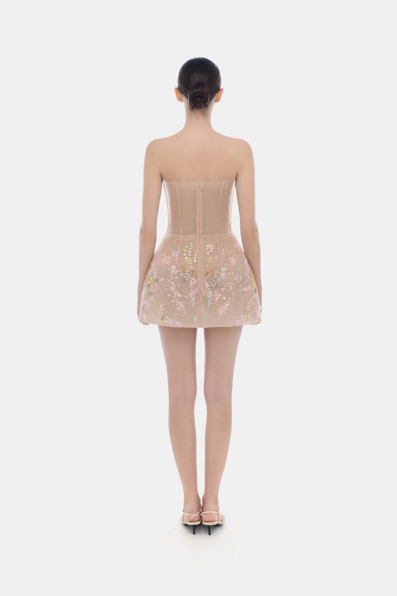 Pastel flower-embellished mini dress by Montsand, featuring delicate floral details and a fitted silhouette.
