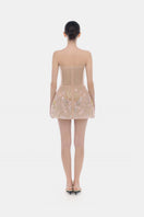 Pastel-colored mini dress with floral embellishments by Montsand, featuring a stylish and feminine design perfect for spring or summer.