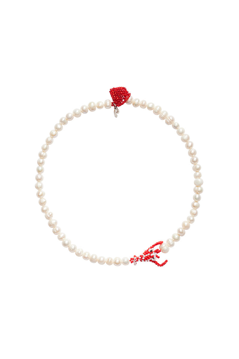 Elegant pearl lobster love necklace by Pura Utz featuring a delicate pearl pendant on a fine chain.