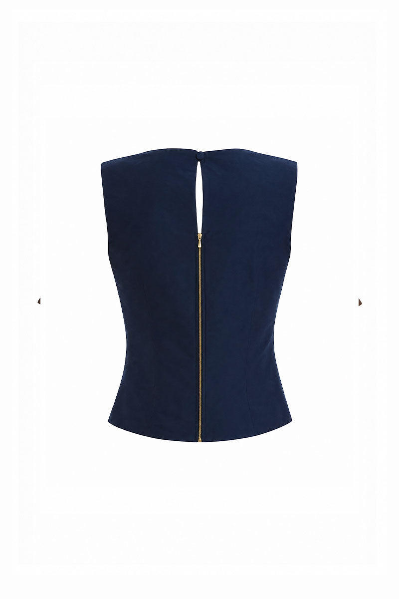 Maylé Vásquez Perla top in brown and navy, stylish sleeveless blouse with a relaxed fit and elegant design.