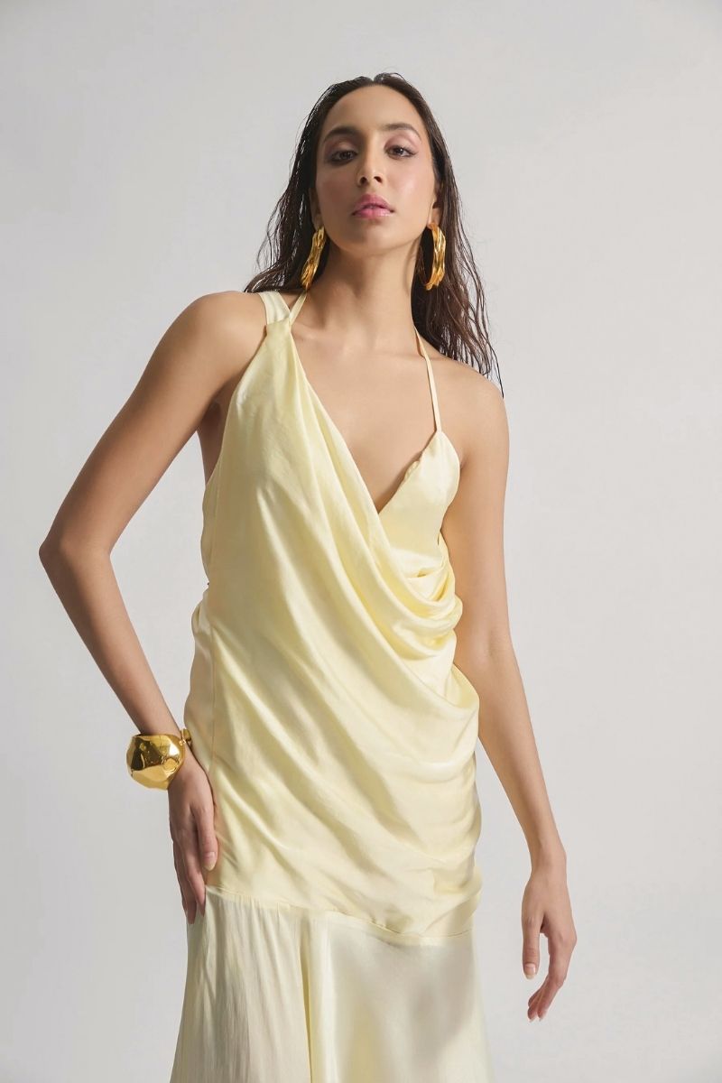 Deme by Gabriella Cult Mia X Deme maxi dress in flowing fabric with a vibrant pattern, featuring a relaxed fit and elegant design.