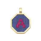 Blue personalized letter pendant necklace by Maria Frering featuring a custom engraved letter on a delicate chain.