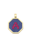 Blue personalized letter pendant necklace by Maria Frering featuring a custom engraved letter on a delicate chain.