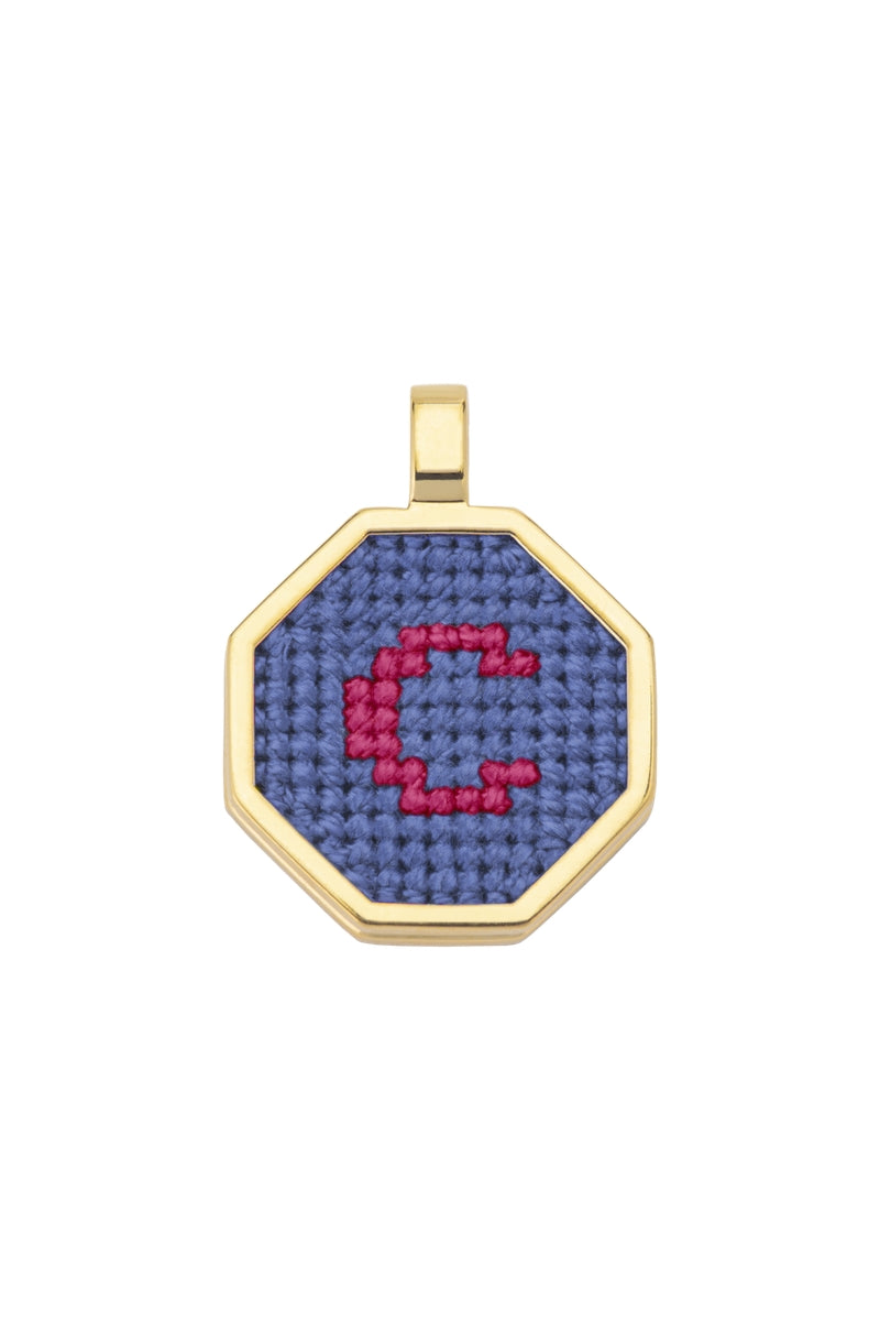 Blue personalized letter pendant necklace by Maria Frering featuring a custom engraved initial on a delicate chain.