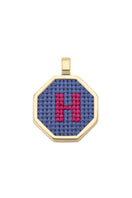 Blue personalized letter pendant necklace by Maria Frering featuring custom initial charm on a delicate chain.