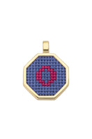 Blue personalized letter pendant necklace by Maria Frering featuring custom engraved initial on a delicate chain.