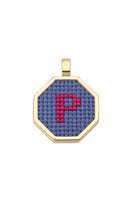 Blue personalized letter pendant necklace by Maria Frering featuring a custom engraved initial charm.