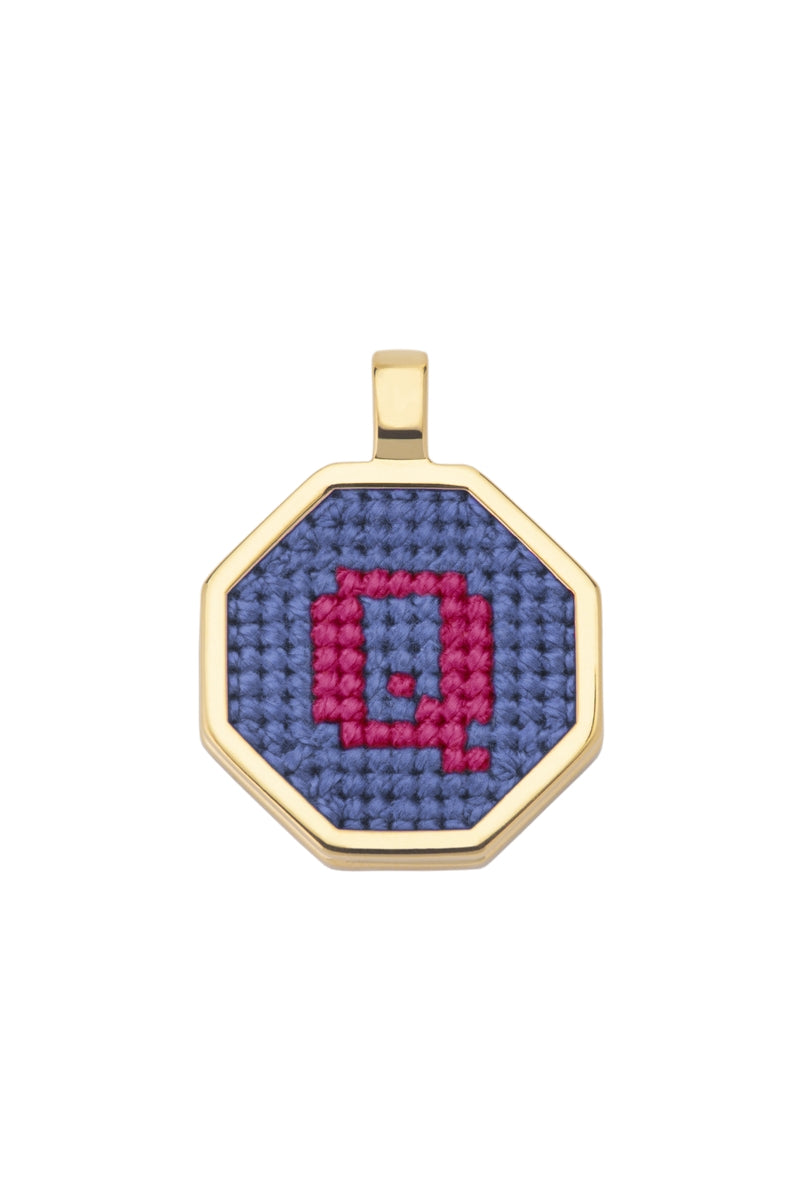 Personalised blue letter pendant necklace by Maria Frering featuring a custom initial charm on a delicate chain.