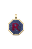 Personalized blue letter pendant necklace by Maria Frering, featuring a custom initial charm on a delicate chain.