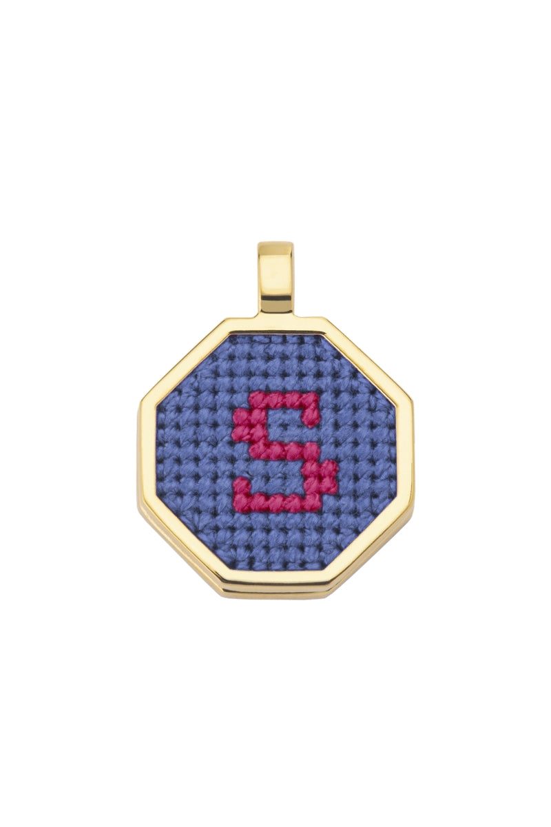 Blue personalized letter pendant necklace by Maria Frering featuring a custom engraved letter on a delicate chain.