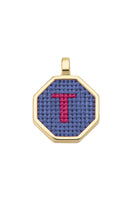 Personalized blue letter pendant necklace by Maria Frering featuring custom letter charm on silver chain.