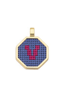 Blue personalized letter pendant necklace by Maria Frering featuring a custom engraved initial on a delicate chain.