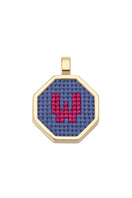 Blue personalized letter pendant necklace by Maria Frering featuring a custom engraved initial on a delicate chain.