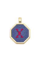 Blue personalized letter pendant necklace by Maria Frering, featuring a custom engraved initial on a delicate chain.