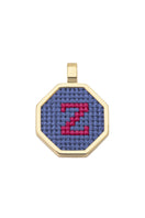 Blue personalized letter pendant necklace by Maria Frering featuring a custom initial charm on a delicate chain.