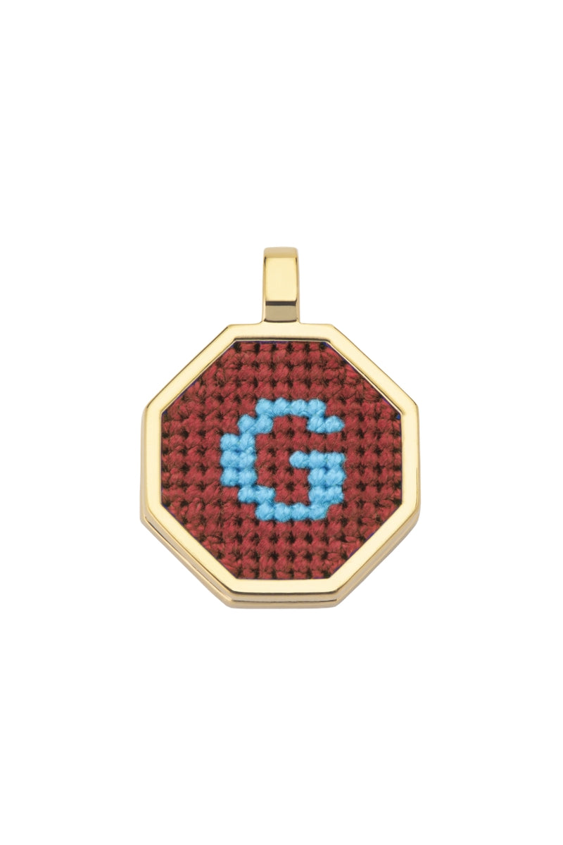 Brown personalized letter pendant necklace by Maria Frering featuring custom engraved initial on a delicate chain.