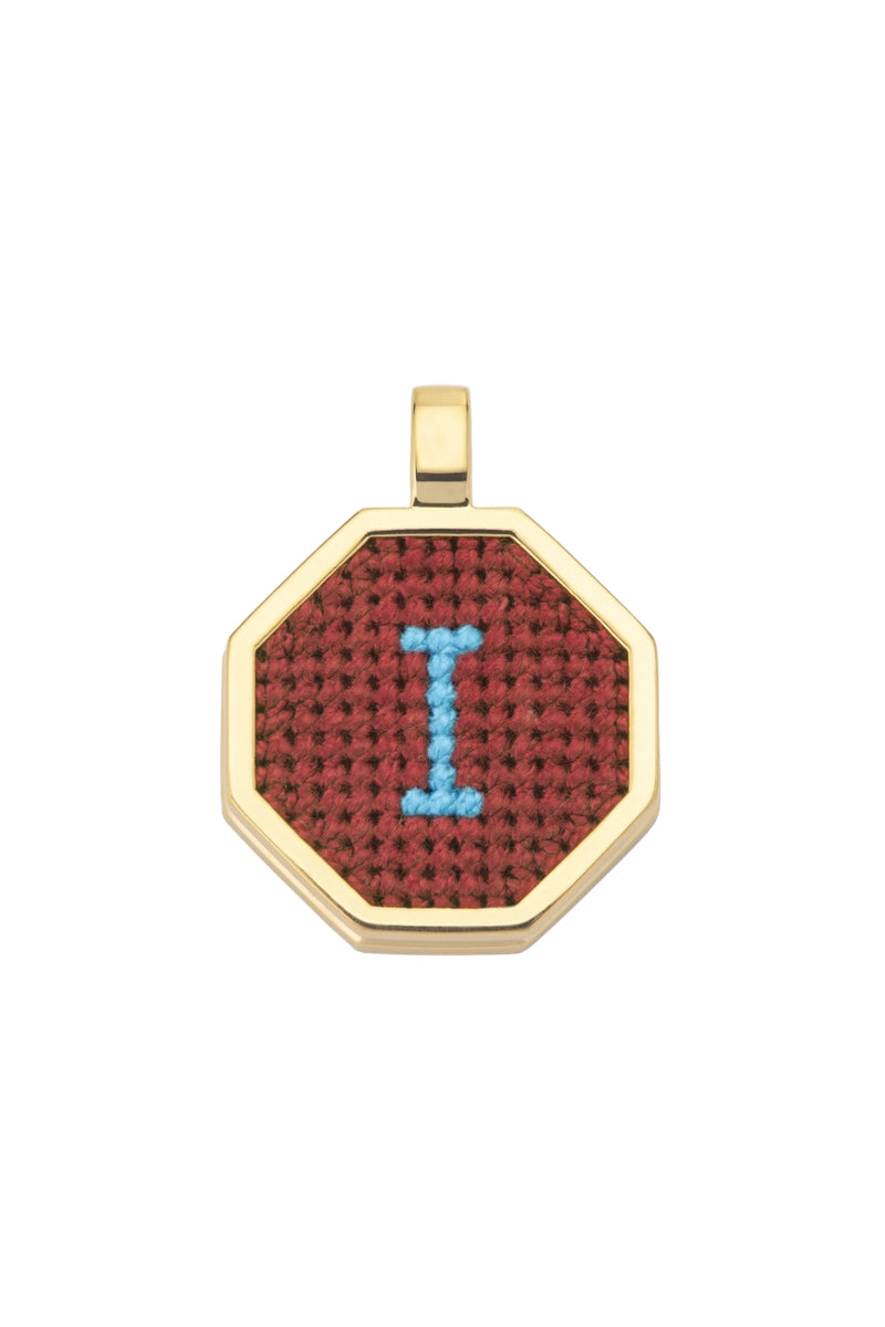 Personalised letter pendant necklace by Maria Frering featuring a brown pendant with custom initial, stylish and elegant jewelry accessory.
