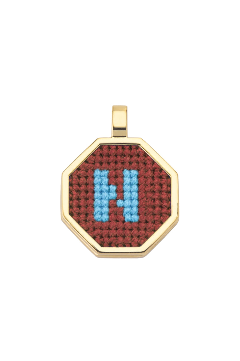 Personalised letter pendant necklace by Maria Frering with a brown pendant and custom initial design.