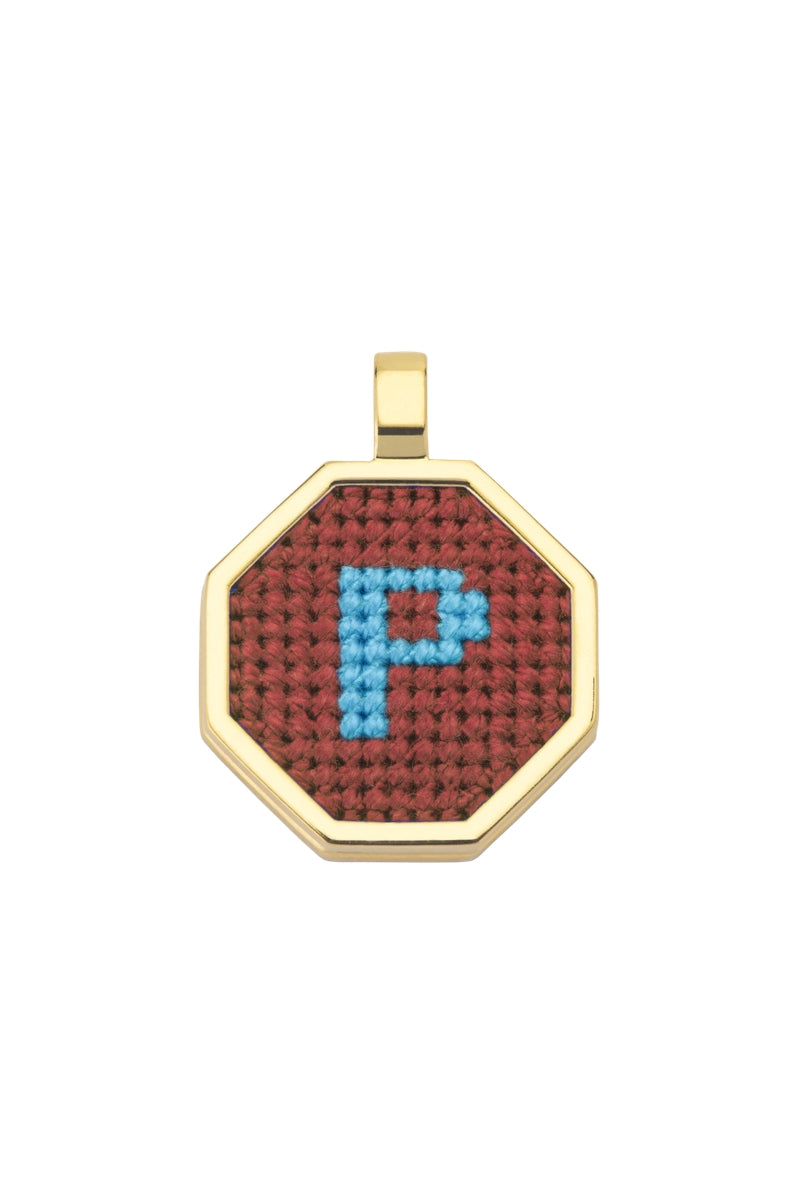 Brown personalised letter pendant necklace by Maria Frering featuring a custom engraved letter charm.