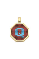 Personalised letter pendant necklace by Maria Frering featuring a brown pendant with engraved initial.