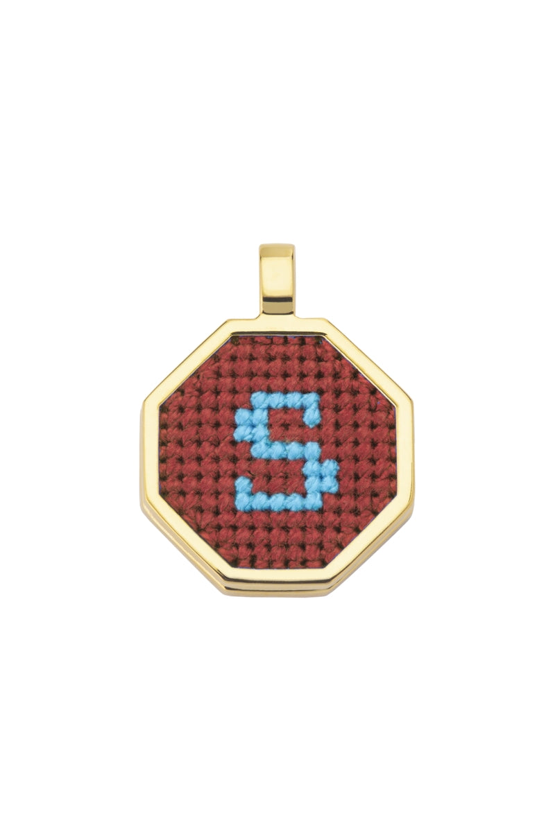 Personalised letter pendant necklace by Maria Frering featuring a brown pendant with custom initial on a delicate chain.