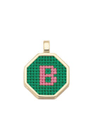 Personalised letter pendant necklace by Maria Frering featuring a green pendant with custom letter design.