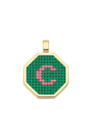 Personalised letter pendant necklace by Maria Frering featuring a green charm with custom initial design.