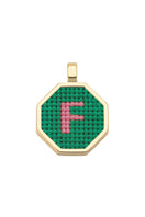 Personalised letter pendant necklace by Maria Frering featuring a green letter charm on a delicate chain.