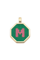 Personalised letter pendant necklace by Maria Frering featuring a green pendant with custom initial design.