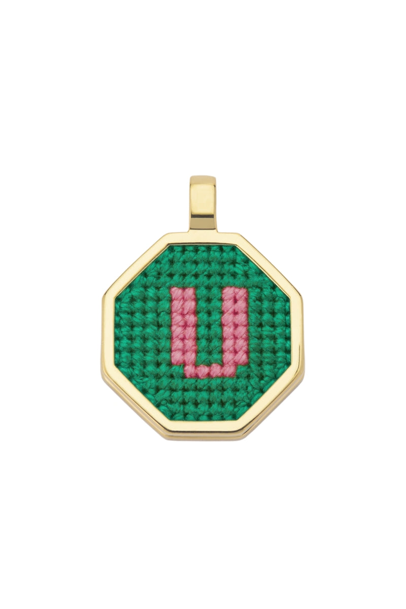 Personalised letter pendant necklace by Maria Frering featuring a green pendant with custom initial design.