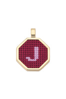 Personalised letter pendant necklace by Maria Frering with a red pendant, featuring a custom initial design.