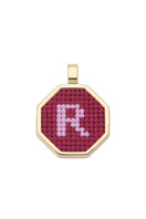 Red personalized letter pendant necklace by Maria Frering featuring a custom initial in elegant design.