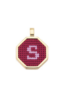Red personalized letter pendant necklace by Maria Frering, featuring a custom engraved initial on a sleek chain.