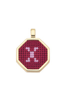 Personalised letter pendant necklace by Maria Frering featuring a red letter charm on a delicate chain.