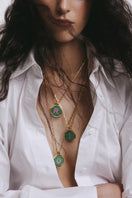 Personalized letter pendant necklace by Maria Frering featuring a custom engraved letter on a delicate chain.