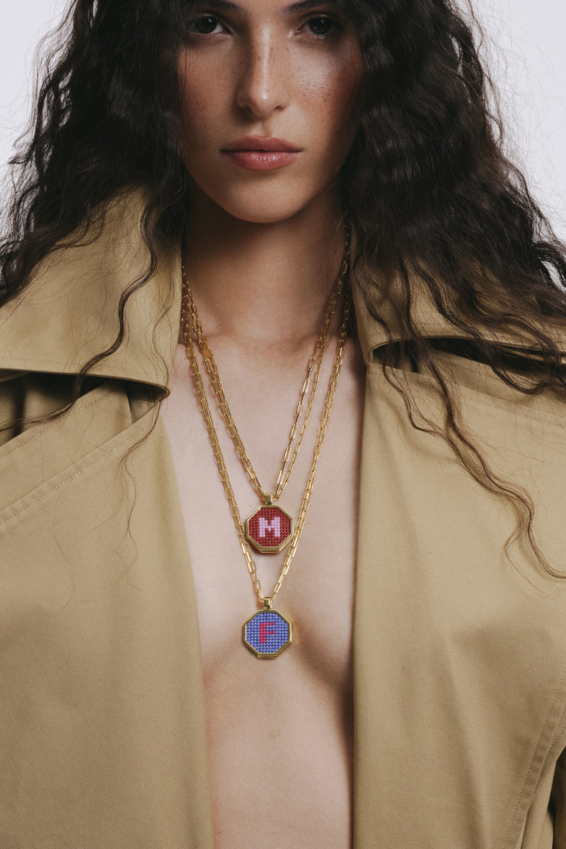 Personalised letter pendant necklace by Maria Frering featuring a customized initial charm on a delicate chain.