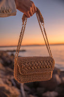 Beige Mara Brazil Petala Lurex shoulder bag with metallic finish, featuring a stylish design and shoulder strap.