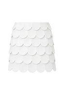 Ivory Petalia mini skirt by ANA + MARIA displayed on a mannequin, showcasing its stylish design and fit.