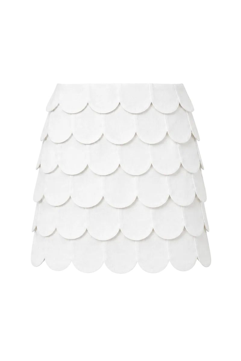 Ivory Petalia mini skirt by ANA + MARIA displayed on a mannequin, showcasing its stylish design and fit.