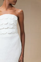 Ivory Petalia crop top by ANA + MARIA featuring a fitted design and sleeveless style, displayed on a neutral background.