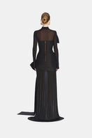 Back view of Montsand Phenomena gown, elegant formal dress with flowing fabric and detailed design, perfect for special occasions.