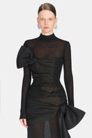 Close-up of Montsand Phenomena gown showing intricate fabric details and elegant design in a high-quality fashion photograph.
