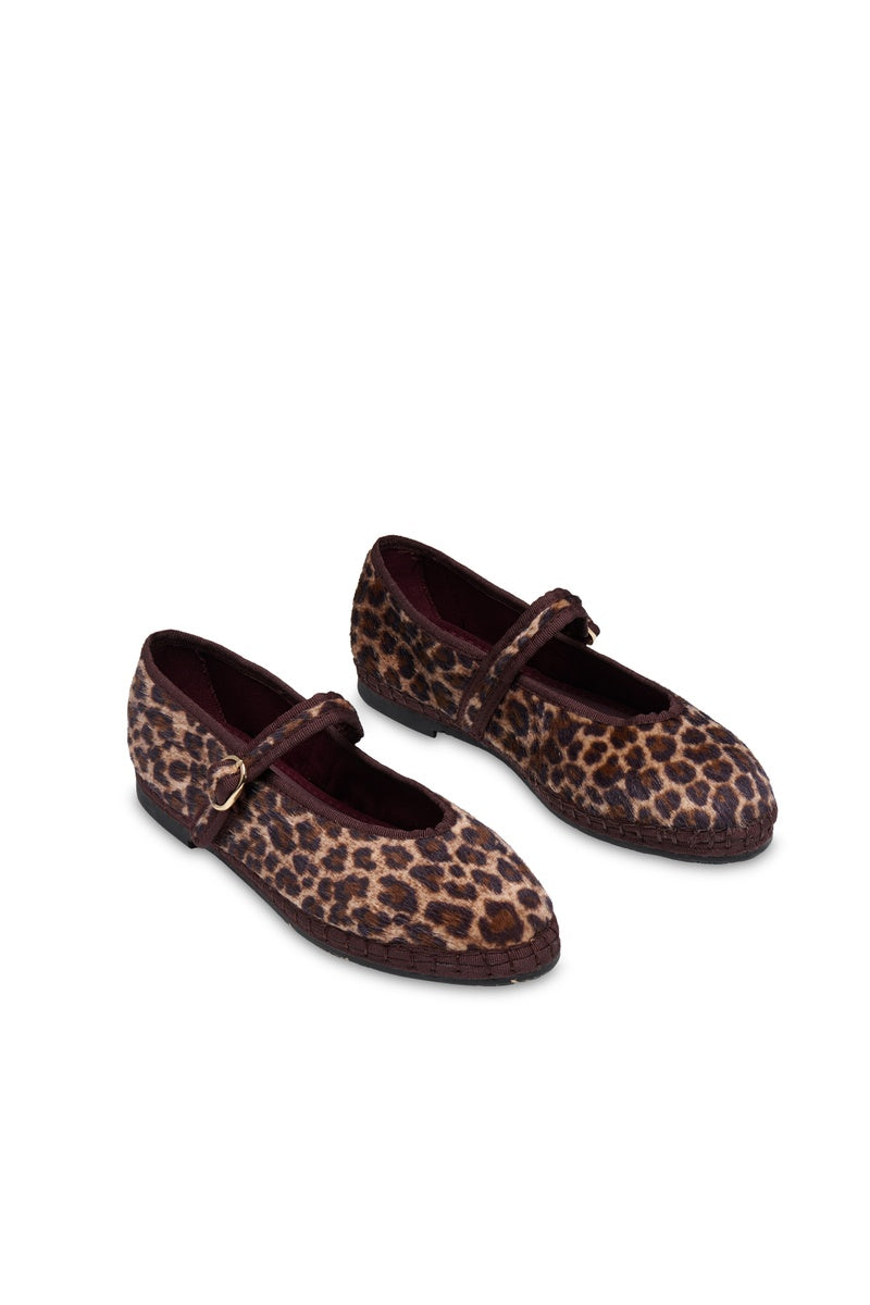 Flabelus Pierre Cheetah flats in black and white with cheetah print, showcasing sleek slip-on design and pointed toe.