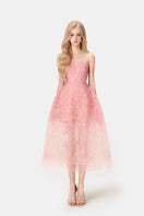 Pink beaded lace midi dress by Montsand, featuring intricate lace details and a flowing midi length, perfect for elegant occasions.
