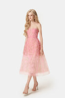 Pink beaded lace midi dress by Montsand featuring intricate beadwork and elegant lace fabric, perfect for special occasions.