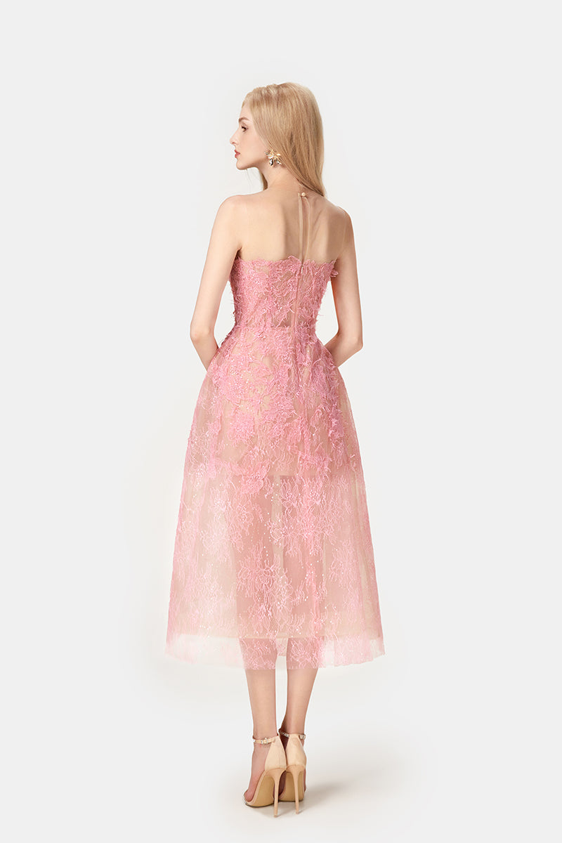 Pink beaded lace midi dress by Montsand featuring intricate lace detailing and a flowing silhouette.