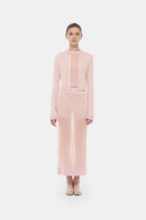 Pink button-up crop cardigan from Montsand, shown in a close-up of the soft pink knit fabric and front button details.