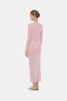 Pink button-up crop cardigan from Montsand, featuring a fitted design and long sleeves, perfect for layered tops.