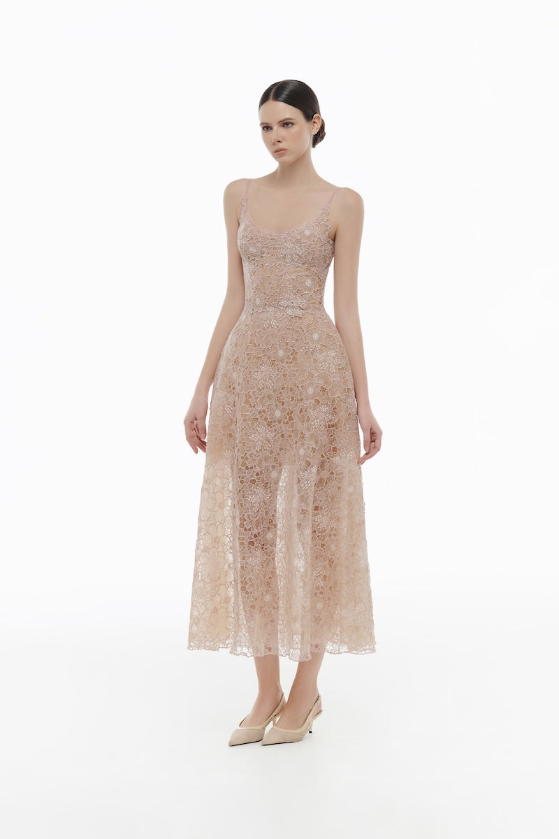 Elegant pink lace gown with floral details from Montsand, featuring a flowing design and intricate lace fabric.